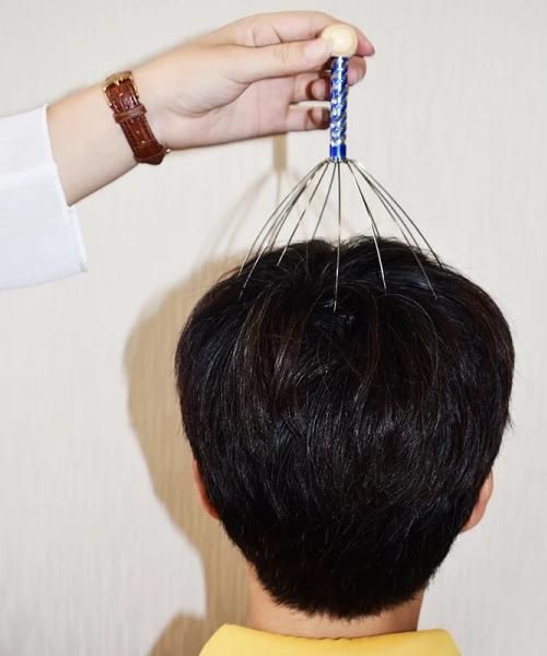 Kopfmassagegerat Scratcher